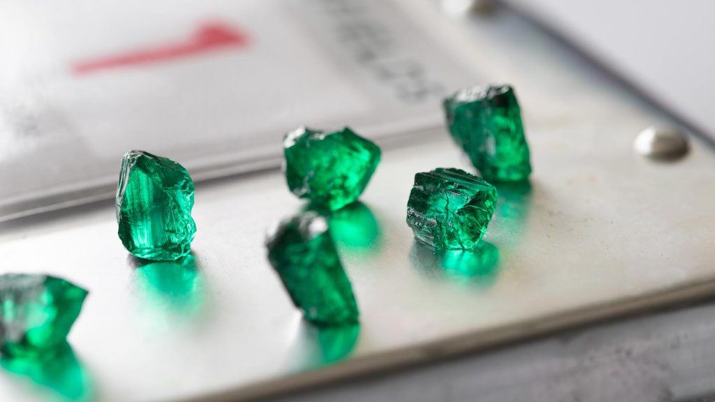 Emerald gemstone symbolizing wisdom, wealth, and career success.