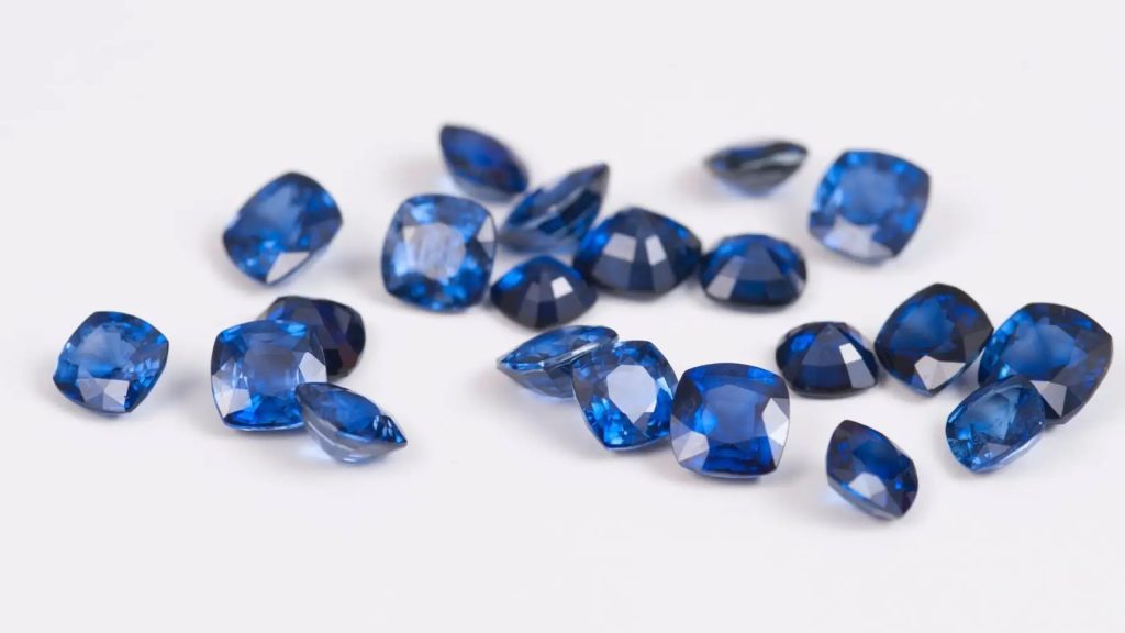 Sapphire stone representing intelligence, clarity, and financial success.